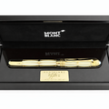 Gold pen in a black Montblanc box on a white background