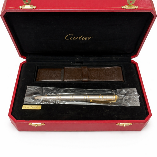 Cartier pen set in a red box on a white background