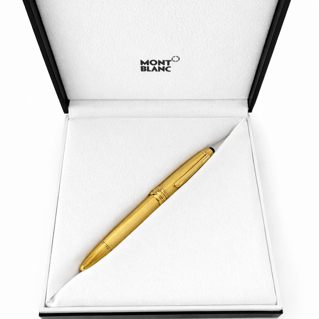 Gold pen in a Montblanc box on a white background