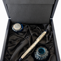 Ink pen set with inkwells in a black box