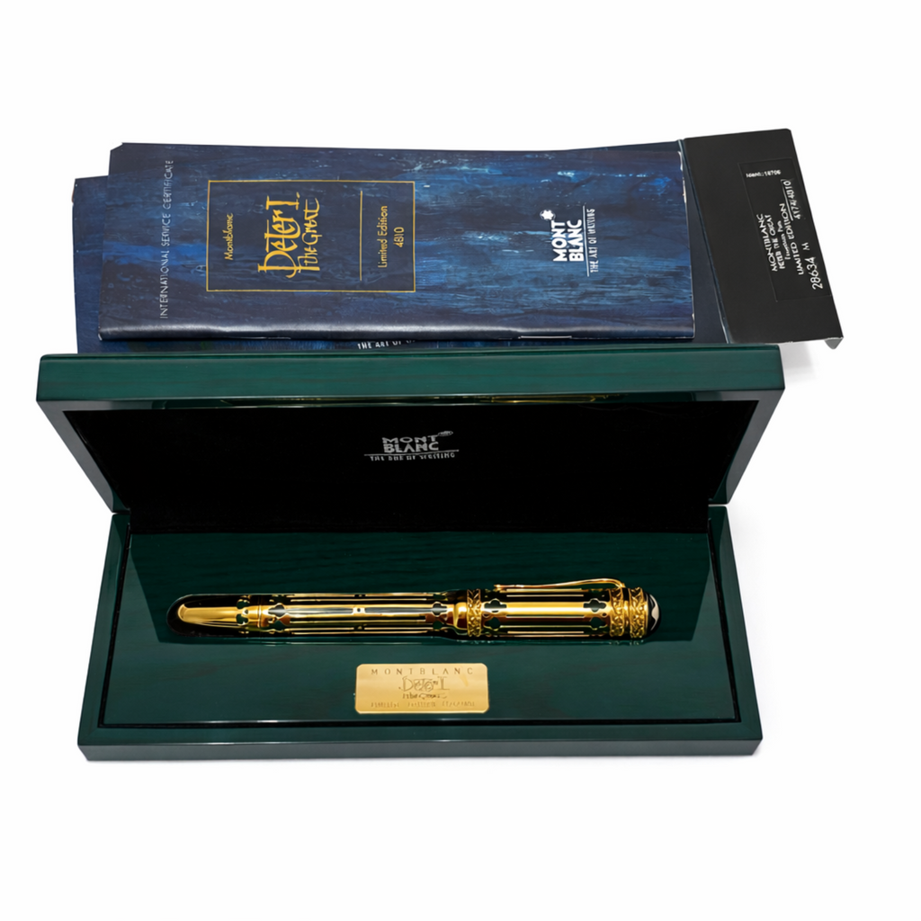 Gold pen in a green box
