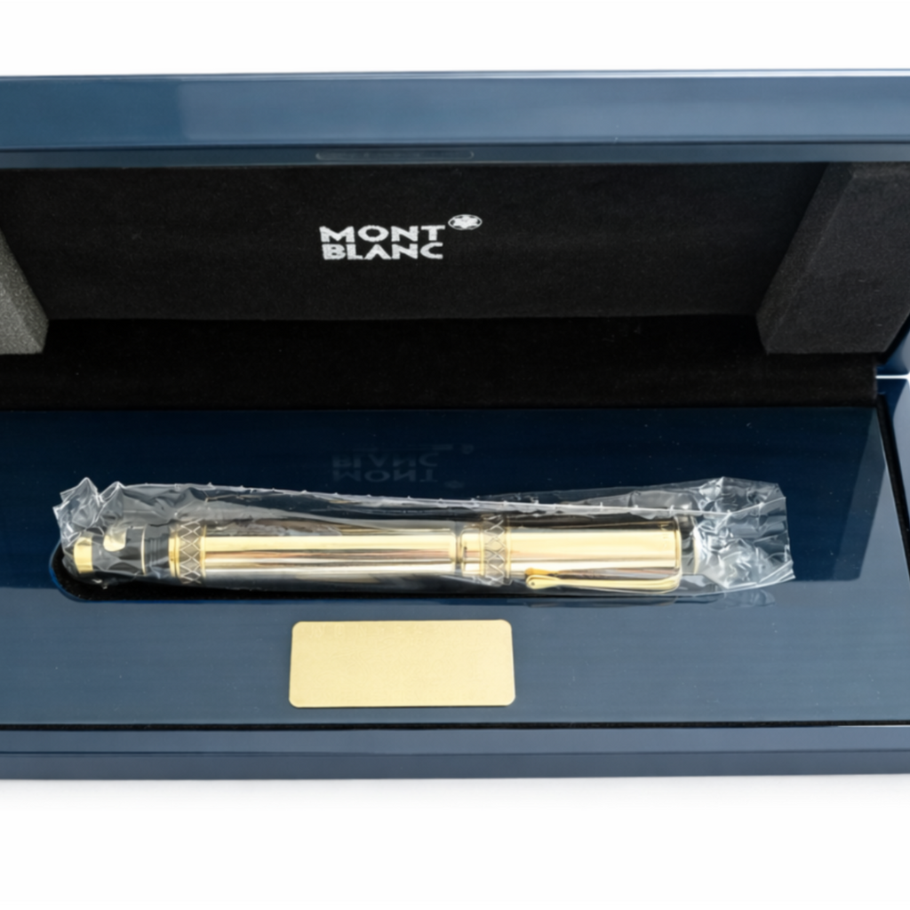 Gold pen with a clear plastic cover in an open blue 