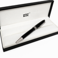 Montblanc pen in an open black box on a white background